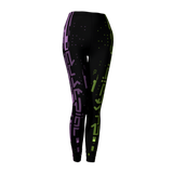 Black leggings with purple and green geometric pattern on a light gray background