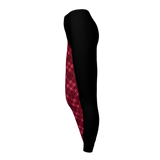 Black leggings with red plaid pattern on a light gray background