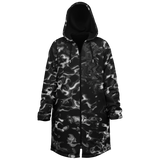 Black and white patterned coat with a hood on a white background