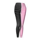 Leggings with black and white grid pattern on one leg and pink and white grid pattern on the other