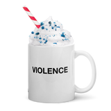 A white ceramic mug with the word 'VIOLENCE' printed in black capital letters, filled with whipped cream topped with blue sprinkles and a red-and-white striped straw, on a white background.